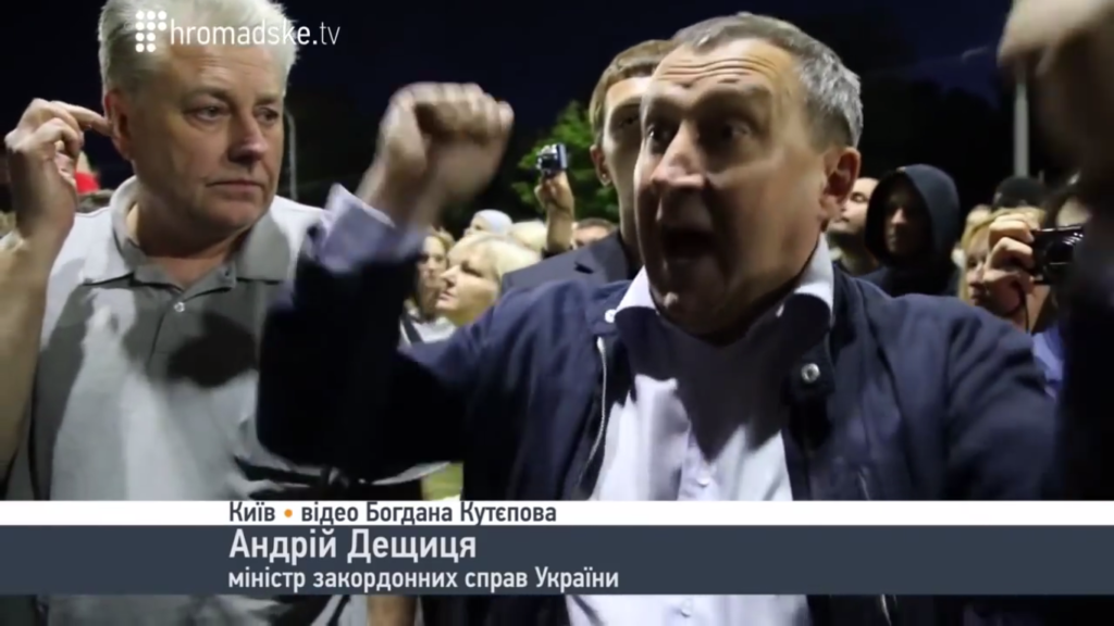 Ukrainian Foreign Minister singing "Putin is a F[censored]er" near the Russian embassy in Kiev
