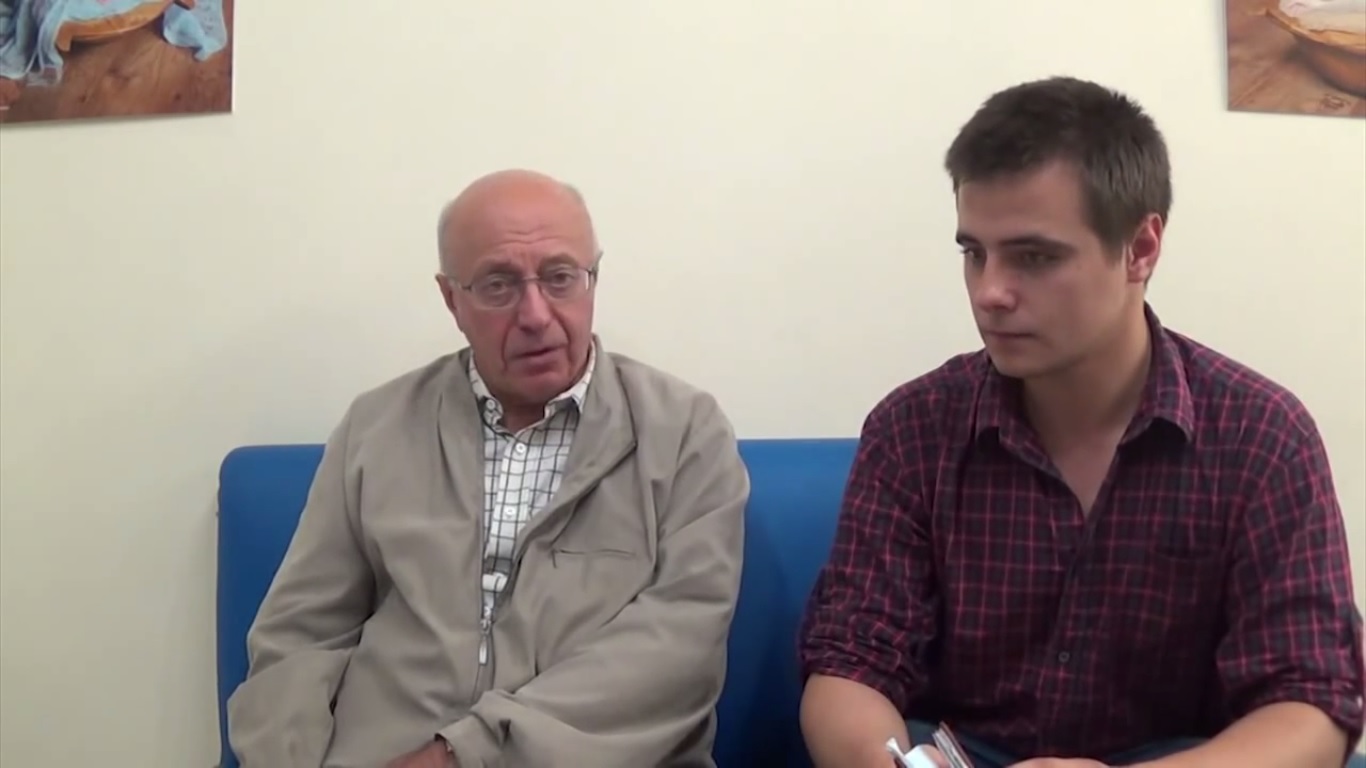 Sergei Kurginyan (left) and journalist (right) during the first press conference. July 6, 2014