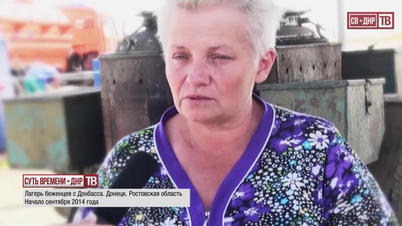 "We had to leave when it became too dangerous to leave the basement, impossible to buy anything, there was nothing in the stores. I feel great here, I go to the kitchen to help the girls. If not for them, what would we do? If they didn't give us such a shelter." "Do you plan to return to Lugansk after the war?" "Yes." Rostov region, Russia. September 2014.  Still from EoT-DPR TV Issue 236