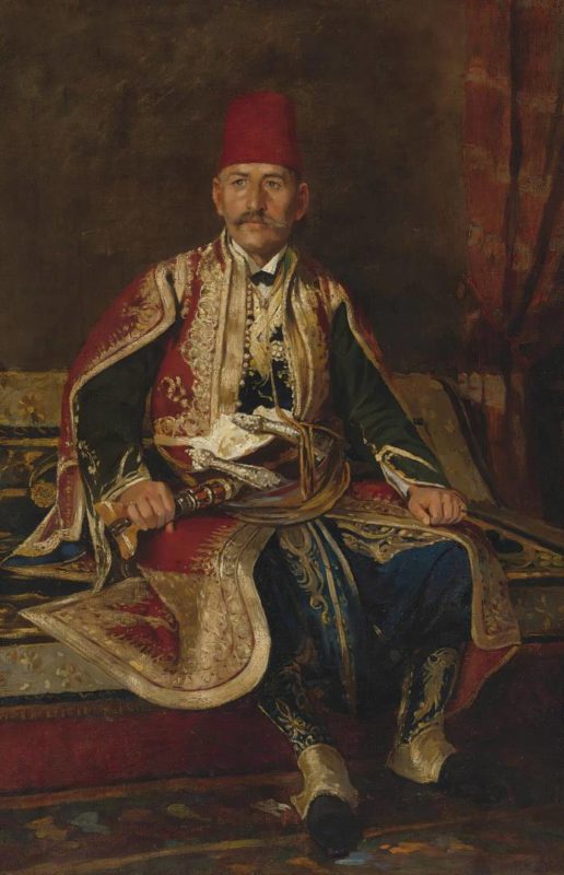 Turkish noble seated in a carpeted interior by Franz Leo Ruben