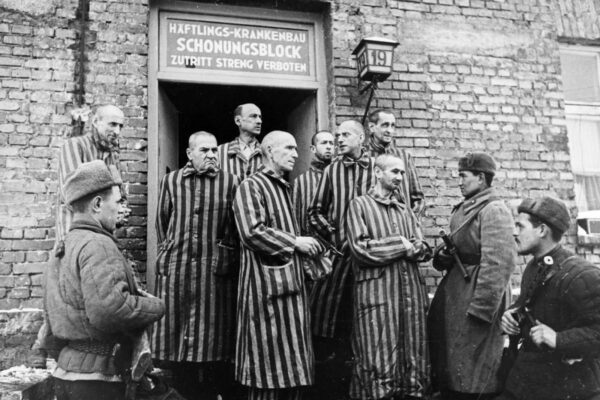 Soviet soldiers release liberated prisoners of a concentration camp